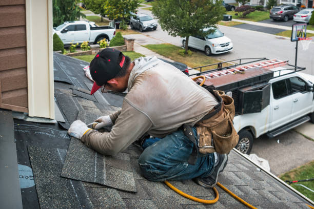 Professional Roofing technician working in Bryant, IL